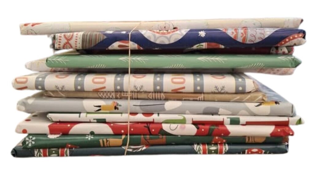 photo of a stack of picture books wrapped in christmas gift wrap