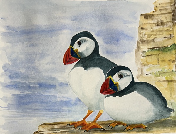 Image of a watercolour painting showing two puffins on a rocky cliff with a blue sea in the background.