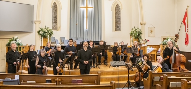 Image of members of the Carpe Diem String Ensemble with instruments