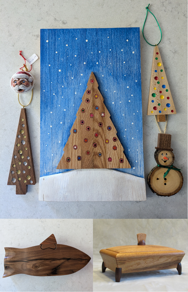 Woodworking art pieces by George Ketcheson. Wooden trees with colourful inserts, wooden snowman, wooden fish shaped box and wooden box with feet.
